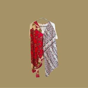 Free People NWT size XS Handkerchief blouse colorful and relaxed fit.
